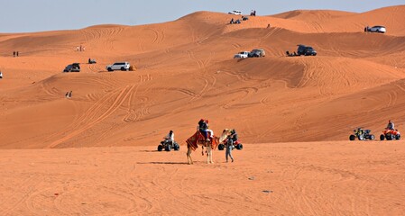 Desert activities include horseback riding, camel riding, and motorcycling on soft sand. © MOD