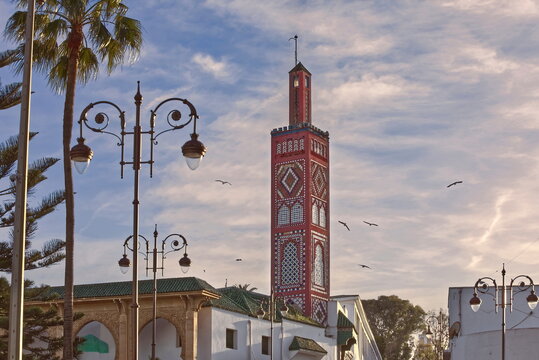 Warm light of early sunset lights up the Grand Socco square and the Sidi Bou Abid mosque, just outside the medina-old city walls. Tangier-Morocco-011