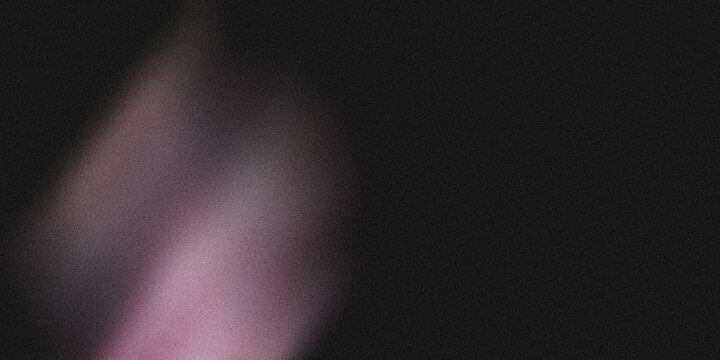 Abstract purple light on dark grainy texture