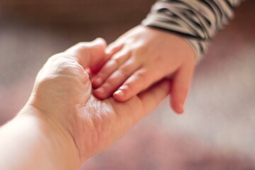 mother and baby hands