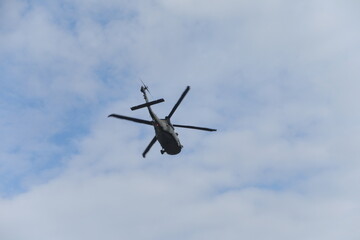 Obraz premium Taipei, Taiwan - January 30th 2026 - Black Hawk helicopter flying in the sky.