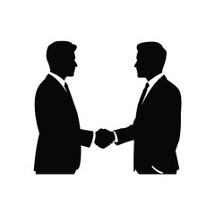 Fototapeta premium Two men in suits shaking hands silhouette handshake