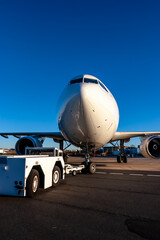 Midnight Freight: Cargo Jet Poised for Departure on Rain-Soaked Runway