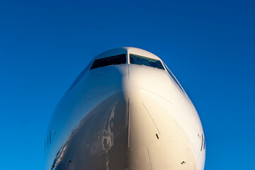 Midnight Freight: Cargo Jet Poised for Departure on Rain-Soaked Runway