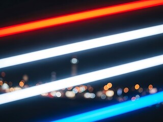 Blurry abstract lines of red, white, and blue light create a dynamic background