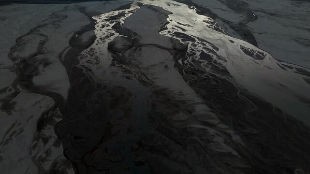 Aerial view of a river drainage basin showing a pattern of water flowing through the landscape, Shigar, Gilgit Baltistan, Pakistan.