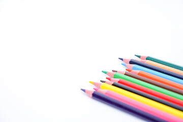 Fototapeta premium colorful pencils fanned out on a clean white background