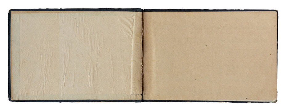 Open vintage blank book with landscape format and aged paper pages, isolated on white