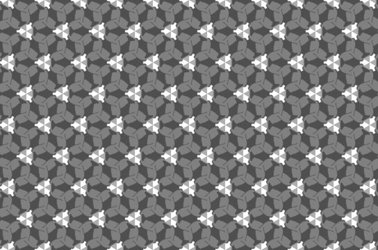A pattern of triangles in a gray and white color scheme