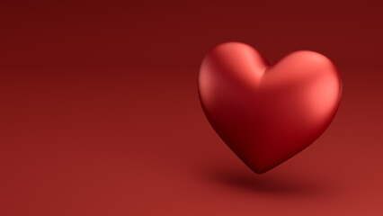 A single, glossy red heart floats against a deep red background with subtle lighting