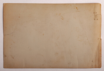 Vintage scalloped edge photo paper background. Aged and yellowed retro photo.