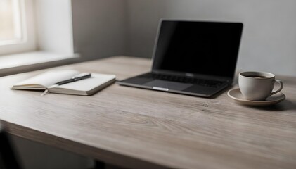 Minimal home office desk with laptop, notebook and coffee cup on wooden table, soft natural light, clean workspace background with copy space