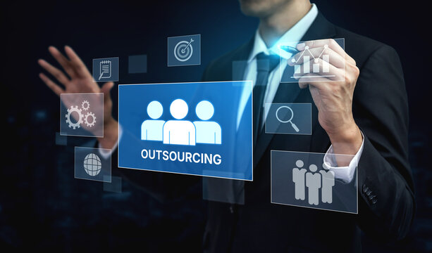 Outsourcing concept showing collaboration, delegation, global workforce, productivity, and task management through remote teams and external service providers Vouch