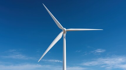 Fototapeta premium Low angle close-up view of isolated white wind turbine tower and three blades against clear deep blue sky