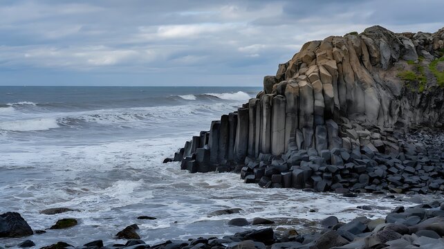Rugged Basalt Column Cliffs with Overcast Sky and Ocean Waves - Serene Coast