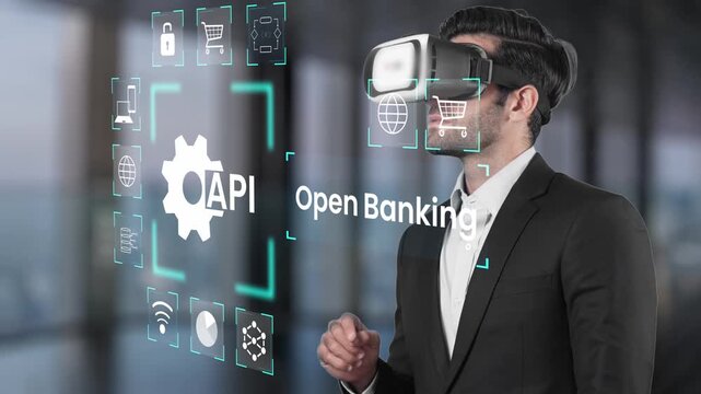 Businessman Using Virtual Reality Glasses with Open Banking Concept and API Integration for Modern Finance Solutions and Digital Transformation Gluon.
