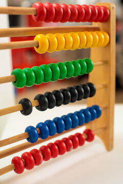 wooden abacus with colorful beads for early learning, educational counting toy for kids, math skills, focus and coordination, classic childhood development concept