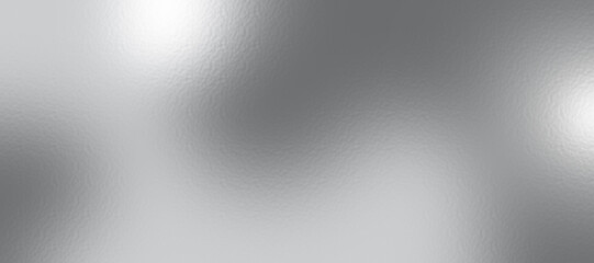 Silver foil texture background with light reflection