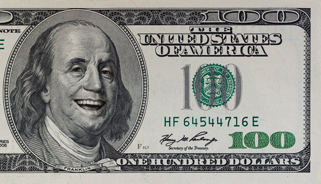 Benjamin Franklin smiling on 100 dollar banknote