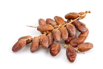 Dates on twigs. A pile of dried fruits isolated on a white background.