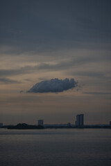 Cargo ships at sea during dramatic sunset