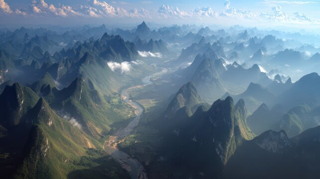 Mist-shrouded peaks and winding rivers seen from above Guangxi&acirc;&euro;&trade;s karst landscape