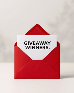 A red envelope revealing a giveaway winners announcement card.