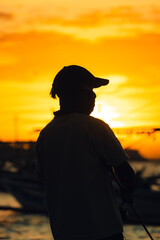 silhouette of a man on the beach