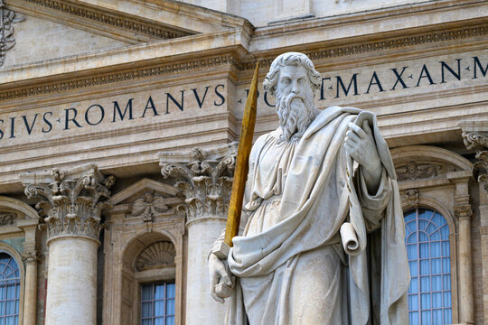 A statue of Saint Paul (by Adamo Tadolini, 1838) in front of Saint Peter's Basilica in the Vatican, Rome, Italy.