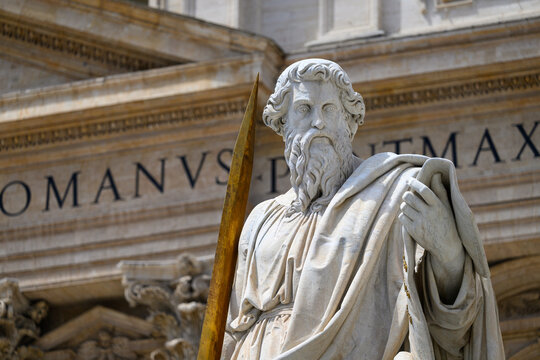 A statue of Saint Paul (by Adamo Tadolini, 1838) in front of Saint Peter's Basilica in the Vatican, Rome, Italy.
