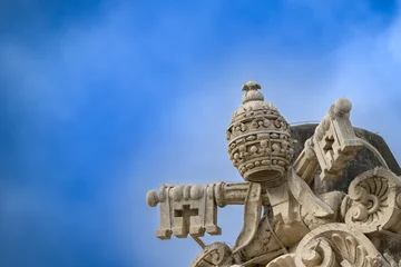 The coat of arms of Pope Alexander VII, atop the colonnade of St Peter's Basilica in Vatican, Rome, Italy. © Adam Ján Figeľ