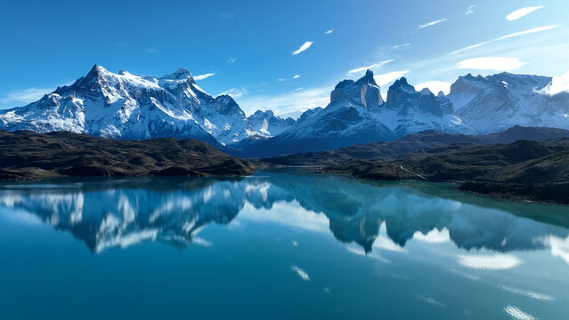 National Park In Torres Del Paine Punta Arenas Chile. Aerial View Of A River Surrounded By Lush Green Tropical Rainforest. Nature Tourism Icon Snow Covered Forest Trees. Nature High Angle View.