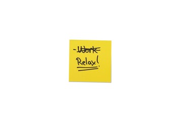 Sticky Note with Crossed-Out "Work" and Written "Relax"
