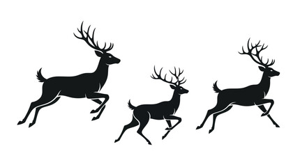Obraz premium Three majestic deer silhouettes are depicted in a dynamic running pose