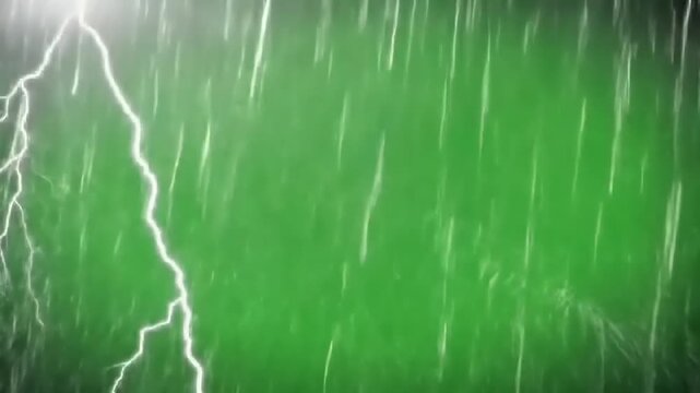 Rain falling against a green background. (1)