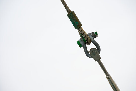 White ship anchor line fitting mounted on painted panel