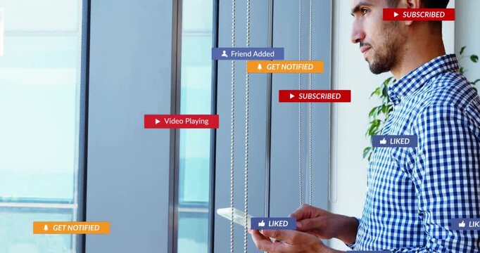 Man at glass tapping tablet, causing badges popping over glass onto him while tracking marketing
