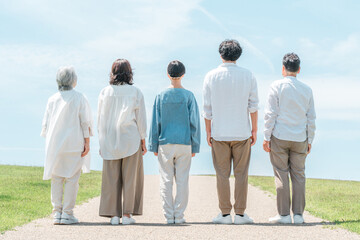 Happy family on a hill with a road, family, parent and child, three generation family