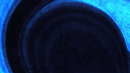 Abstract dark blue background with circular grunge texture and luminous neon glowing light effect for cinematic modern digital wallpaper © Muhammadferi