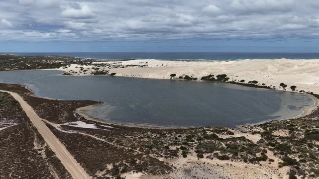 Blue Lake, Penong, South Australia &ndash; 4k aerial drone footage of salt lakes, beaches, coastal sand dunes, limestone cliffs and Southern Ocean shoreline