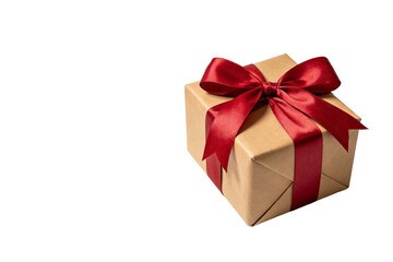 Obraz premium Brown gift box with red satin ribbon bow, isolated on white background. Represents gifting, celebration, and festive occasions like holidays or birthdays.