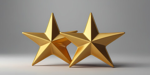 Obraz premium Two golden stars overlapping on a gray surface viewed from a slightly elevated angle
