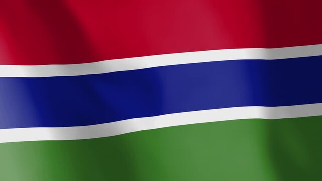 Flag of Gambia animated background. Symbol of the Gambian nation and the culture. Waving flag in the wind footage. State ensign of the country in West Africa.