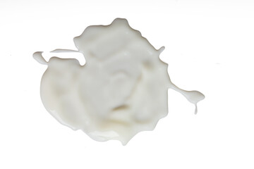 A high-resolution 45MP photograph of yogurt spilled on a white surface is perfect for cutting out and using.