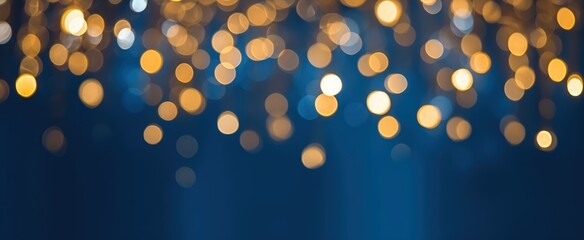 A blurred background featuring soft, glowing lights in warm tones against a deep blue backdrop, creating a dreamy and festive atmosphere.