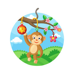 Obraz premium Handmade monkey keychain hanging from a tree branch in a vibrant garden on a sunny day 