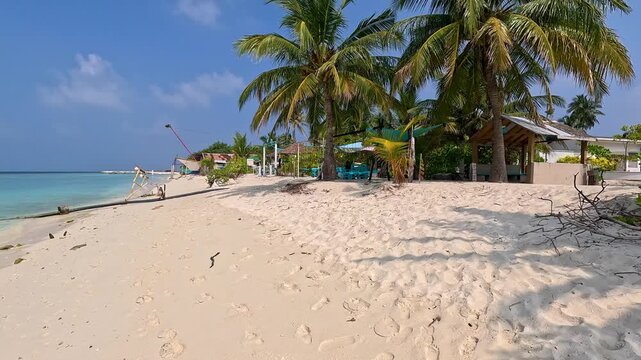 Ukulhas maldives bikini beach white sand remote exotic island palm trees