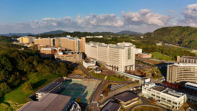 Fukuoka, Japan: Aerial Drone View of Kyushu University Ito Campus in Nishi Ward, Modern University Buildings, Mountain Landscape, Forest Hills, Farmland, Rural Japan and Coastal Views