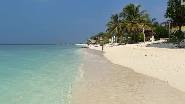 Ukulhas maldives bikini beach white sand remote exotic island palm trees
