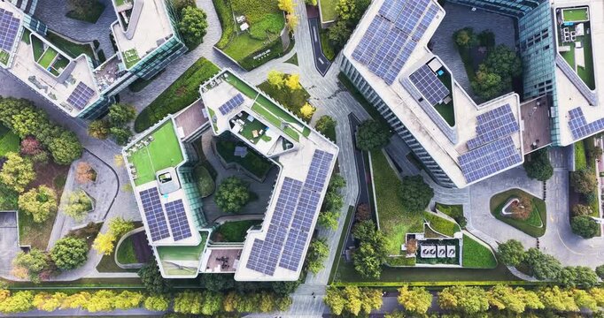 Aerial view of modern eco city with solar panels on roof